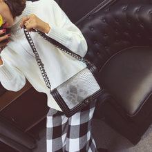 snakeskin clutch purse